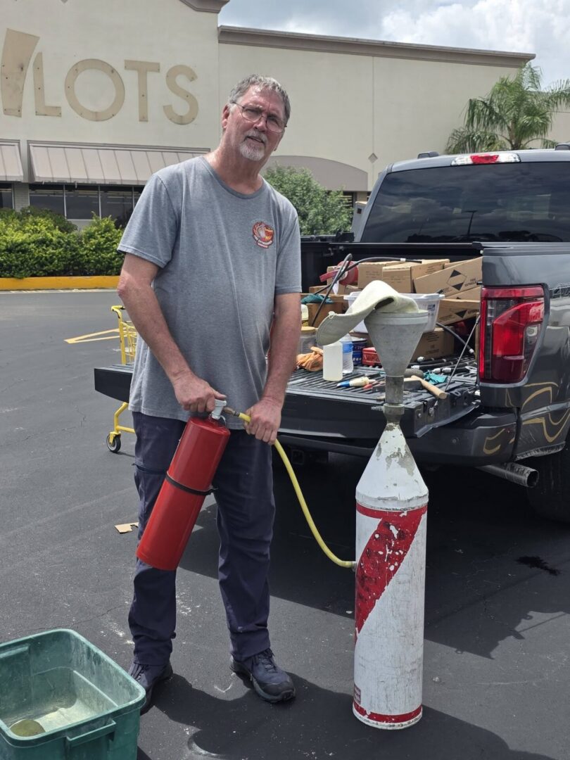 RECHARGING A FIRE EXTINGUISHER